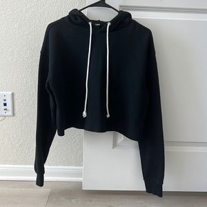 This is a cropped sweater from Wild Fable. It’s a size Small and it’s black.